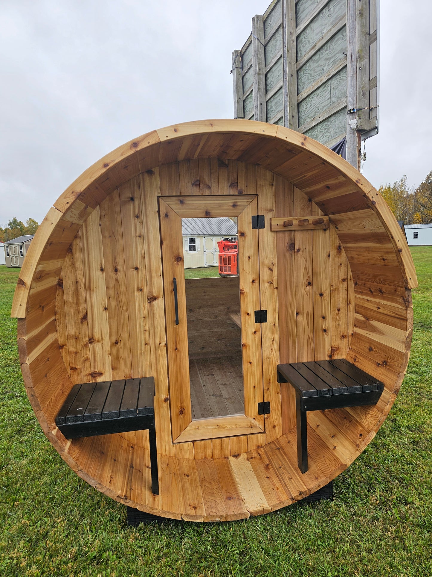 4-6 person Barrel Sauna with Harvia electric heater.