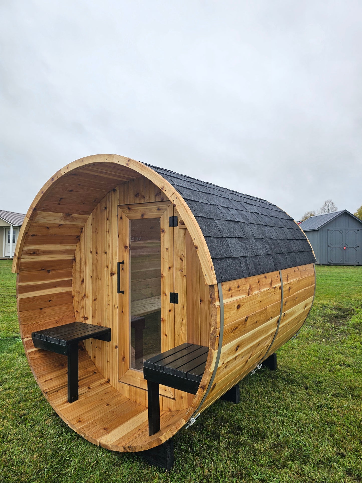 4-6 person Barrel Sauna with Harvia electric heater.