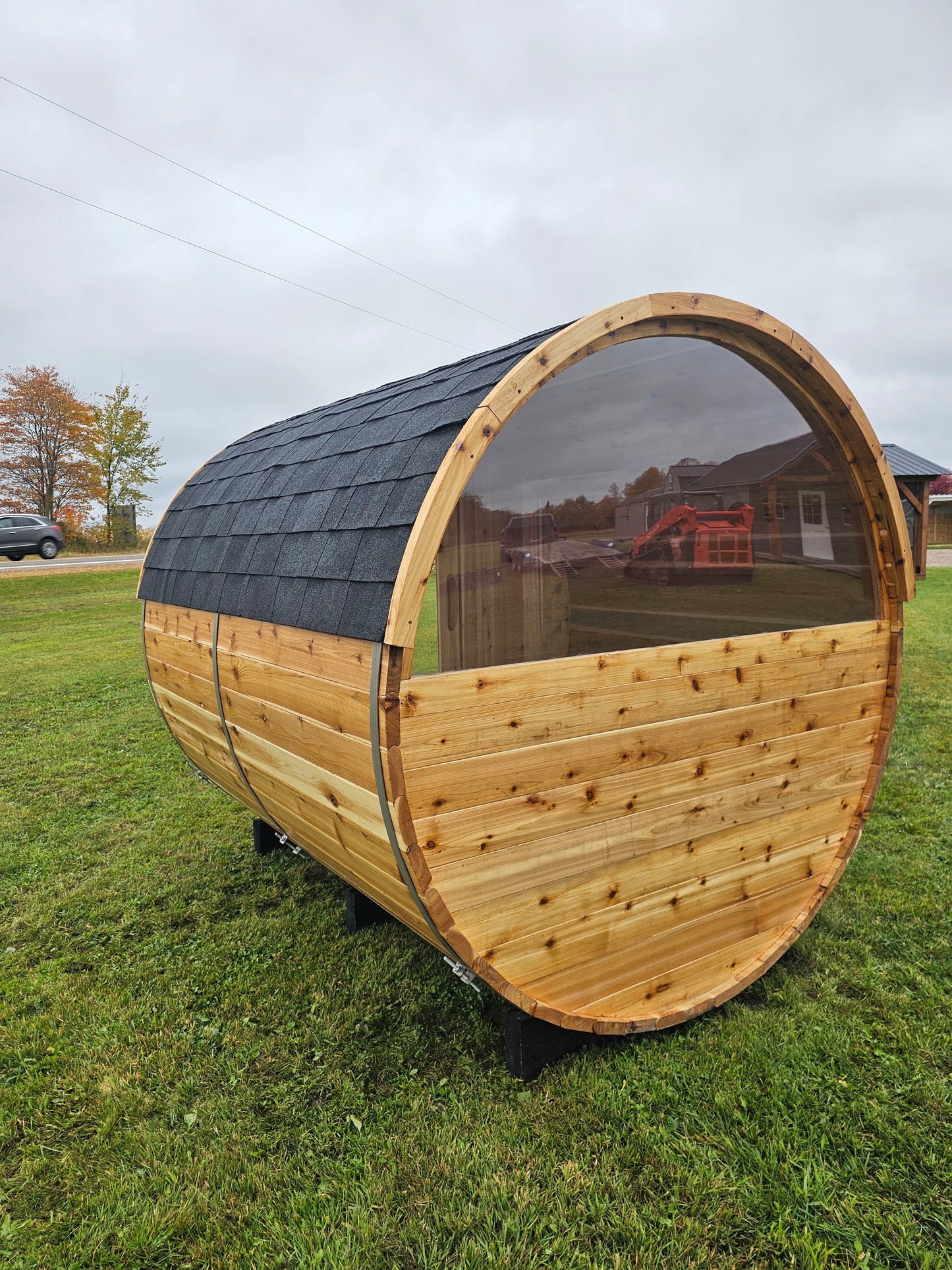 4-6 person Barrel Sauna with Harvia electric heater.