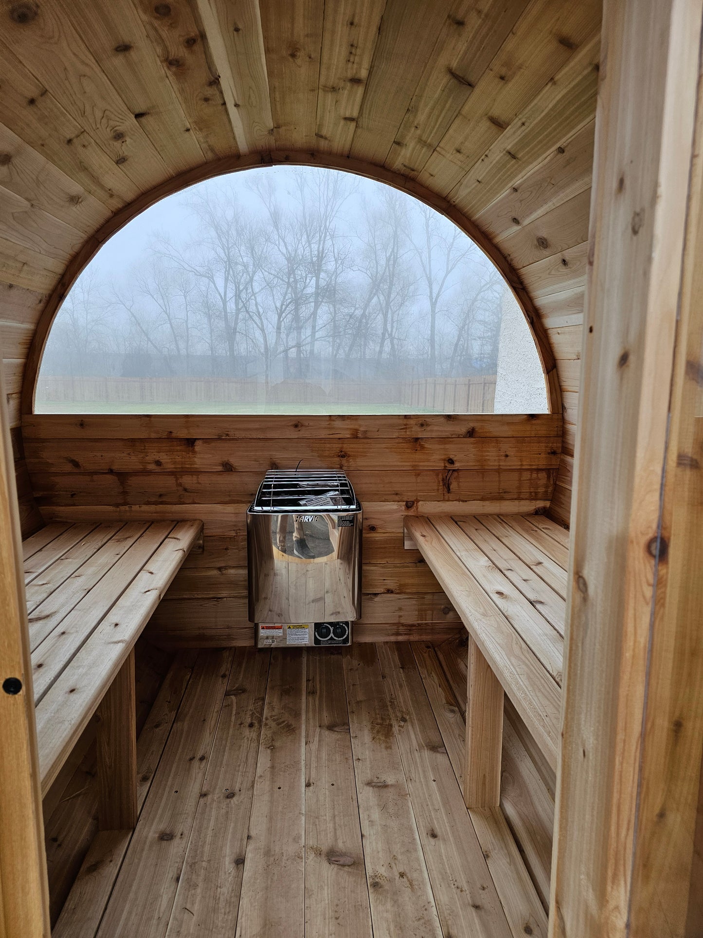 4-6 person Barrel Sauna with Harvia electric heater.